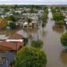 ZARATE : BAJO EL AGUA PIDE AYUDA .